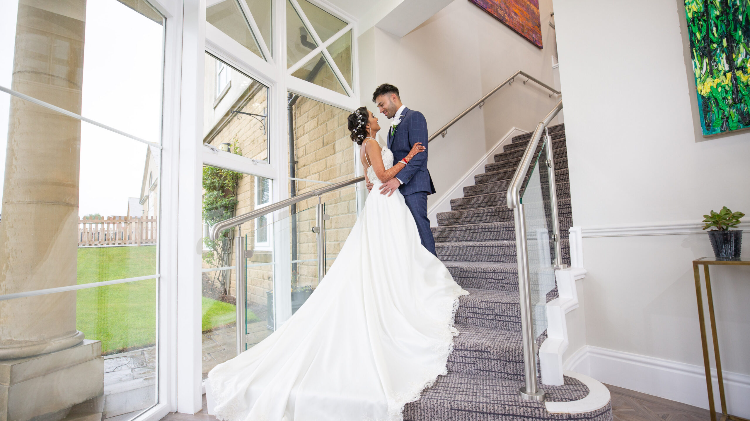 Pavilions of Harrogate Asian Wedding Photo Couple on Staircase