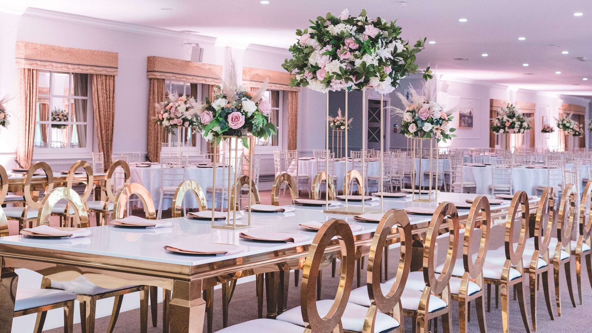 Pavilions of Harrogate South Asian Wedding Decor Gold Chairs Pink Flowers